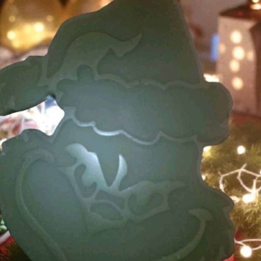 Festive Green Santa Figurine